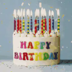 Birthday cake with balloons and confetti