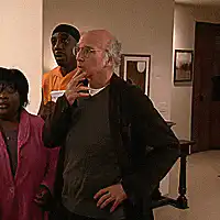 Larry David smoking and reacting