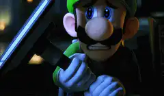 Luigi looking at a phone