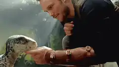 Owen Grady petting baby raptor
