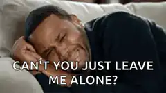 Man crying on couch leave me alone