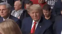 Donald Trump gives thumbs up then points