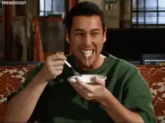 Adam Sandler eating cereal with milk on his face