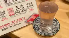 Pink Lady cocktail with menu