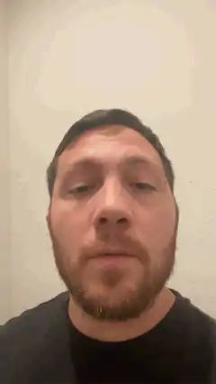 Man looking around confused