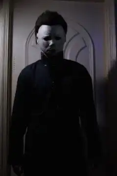 Michael Myers standing in a doorway