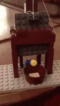 Lego fireplace with falling log