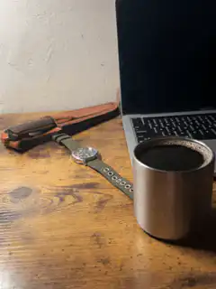coffee cup on wooden desk