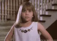 Young girl facepalms in frustration