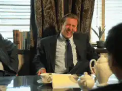 Nicolas Cage laughing hysterically