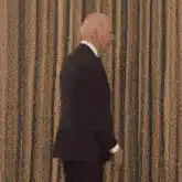 Joe Biden turns and smiles
