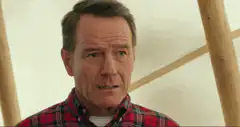 Walter White smiling and talking