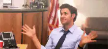 Jim Halpert shrugging in the office