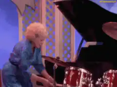 Lucille Ball playing drums