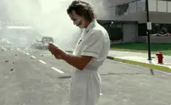 Joker laughing on street
