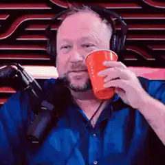 Doug Benson sips from red cup