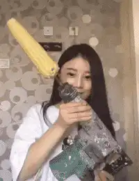 woman drills corn on cob
