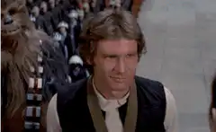 Han Solo smirks at Chewbacca