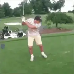 golfer falls over after swing