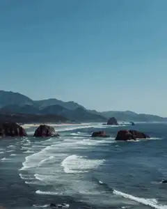 Ocean waves rolling onto rocky shore