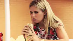 Chelsea Handler eating a burrito