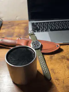 watch and coffee on desk