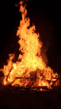 large bonfire burning at night