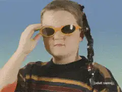 Girl puts on orange sunglasses