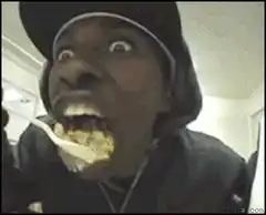 Man eating cereal with wide eyes