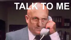 Talk to Me bald man on phone