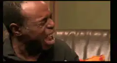 Man laughing hysterically
