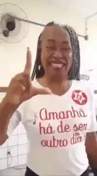 Woman laughing and pointing finger