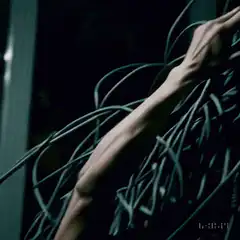 Hand tangled in cables