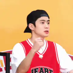 Boys Planet contestants flexing