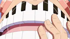 Brook playing piano teeth