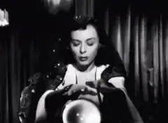 Woman gazing into crystal ball