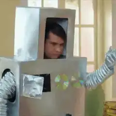 Man in cardboard robot costume