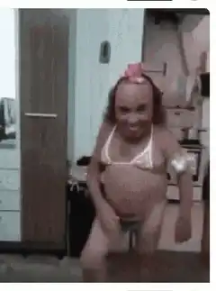 Dancing person in bikini and mask