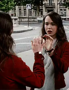 Ellen Page hand on glass