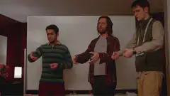 Three guys holding blue balls