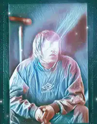 Man with glowing eyes in blue tracksuit