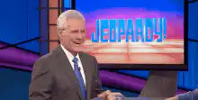 Alex Trebek clapping on Jeopardy!