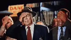 Audience facepalming at a movie