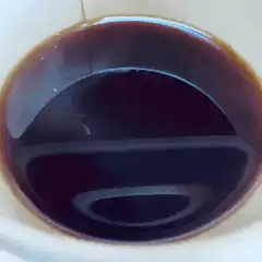 Dark liquid in a cup