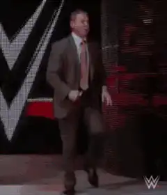 Triple H running on stage