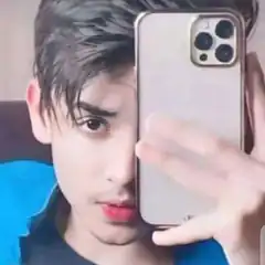 man holding phone over face