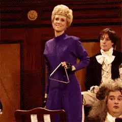 Princess Diana holding a triangle