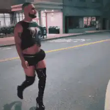 Drake walking in thigh-high boots