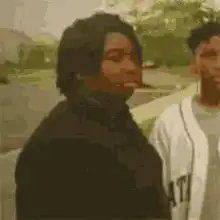 man gets hit in the face with a bag