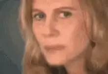 woman looking sideways with skeptical expression